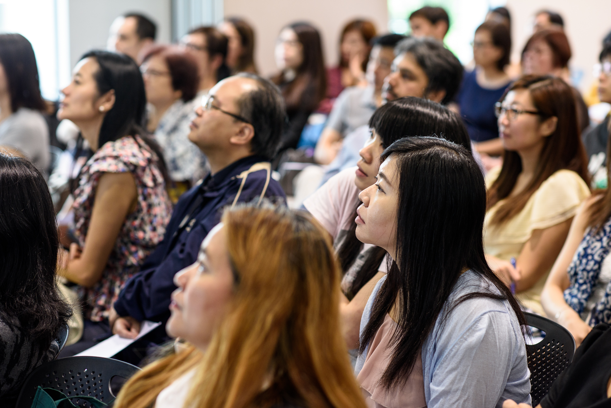 Audience listening attentively at a MyIT training session